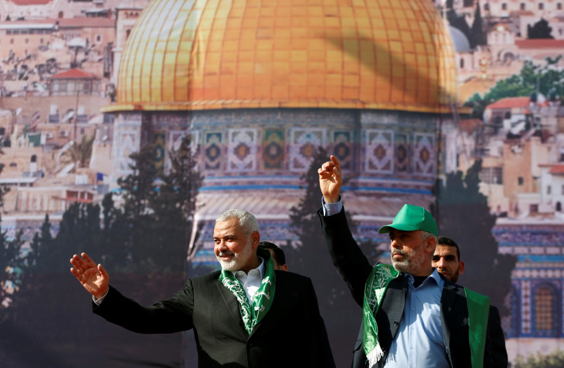 Hamas Chief Ismail Haniyeh (L)  and Gaza\'s Hamas Chief Yehya Al-Sinwar  (R).jpg