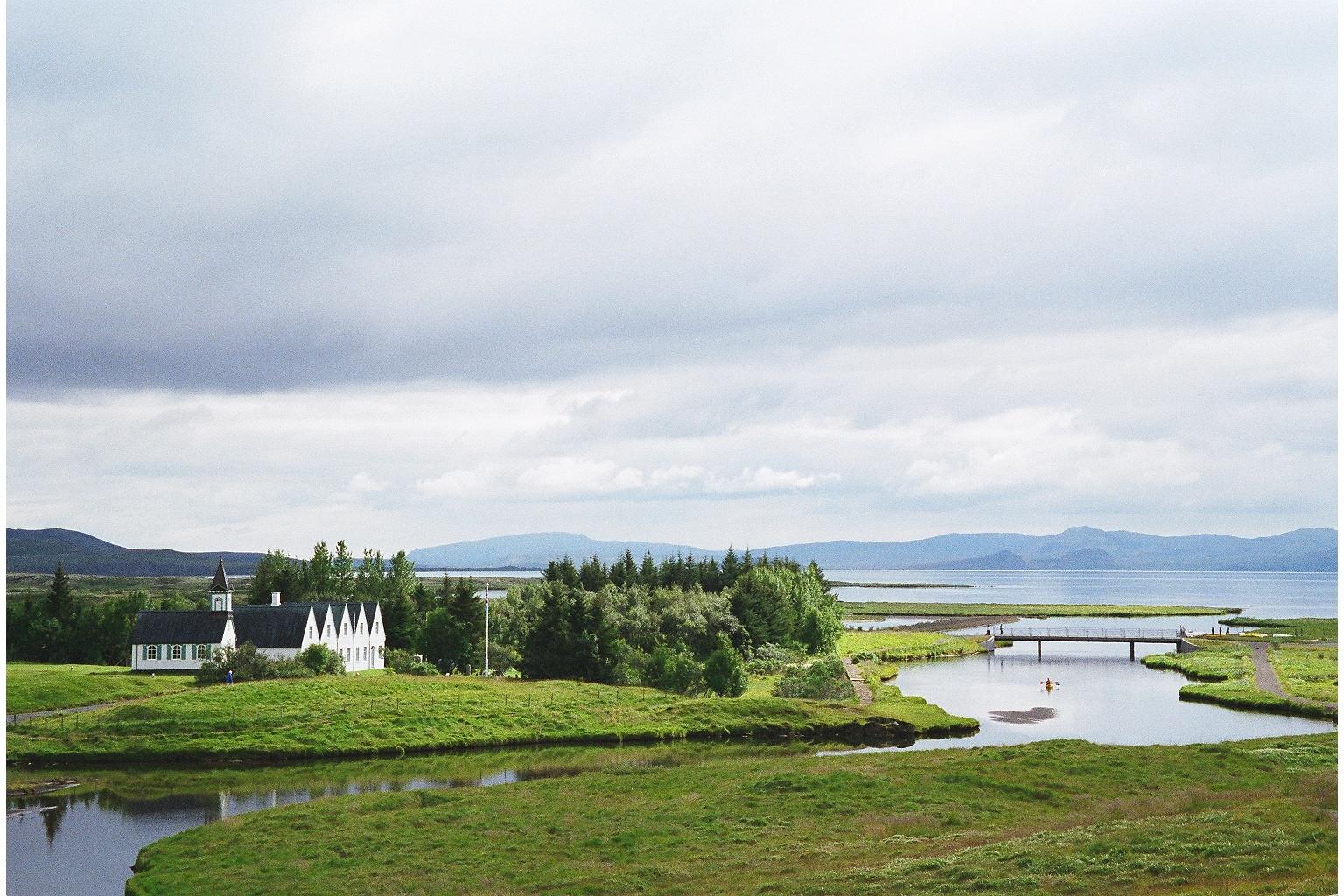 Iceland-Parliamentary-Plains-lake-mountains-houses-church-canoe-1-BG.jpg