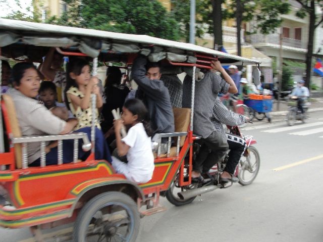 226819-a-tuk-tuk-full-of-passengers-phnom-penh-cambodia.jpg
