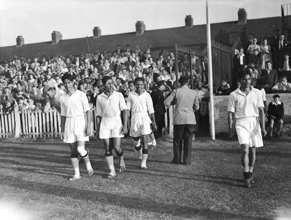 India players walk out at Ilford for their match against France, the majority of.jpg