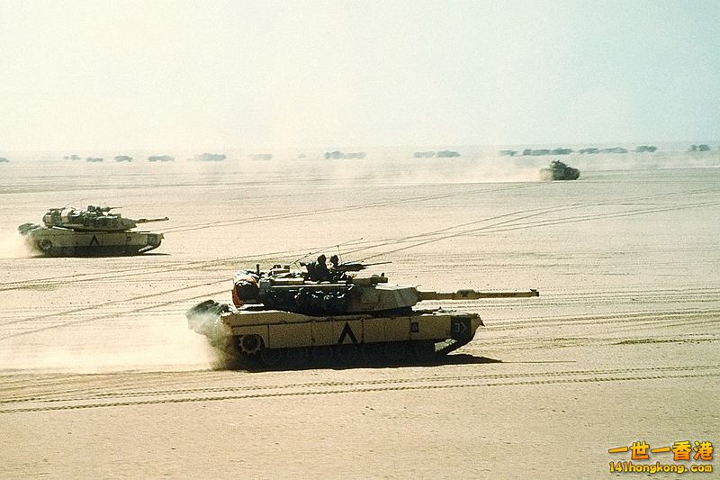 Abrams move out on a mission during Desert Storm in 1991. A Bradley IFV and logi.jpg