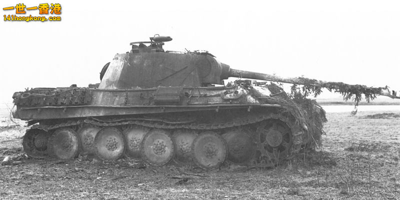 Burnt out Panther Ausf.G at the Battle of the Bulge, penetrated in the sponson..jpg