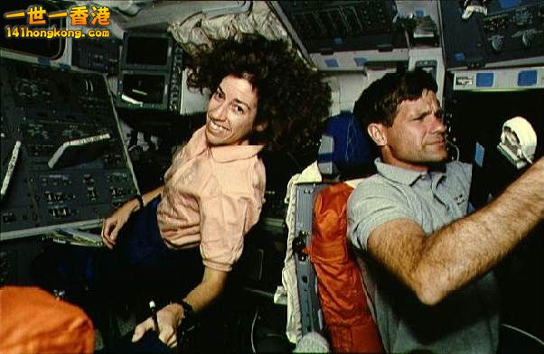Astronaut Ellen Ochoa at RMS controls on aft flight deck of the Space Shuttle At.jpg