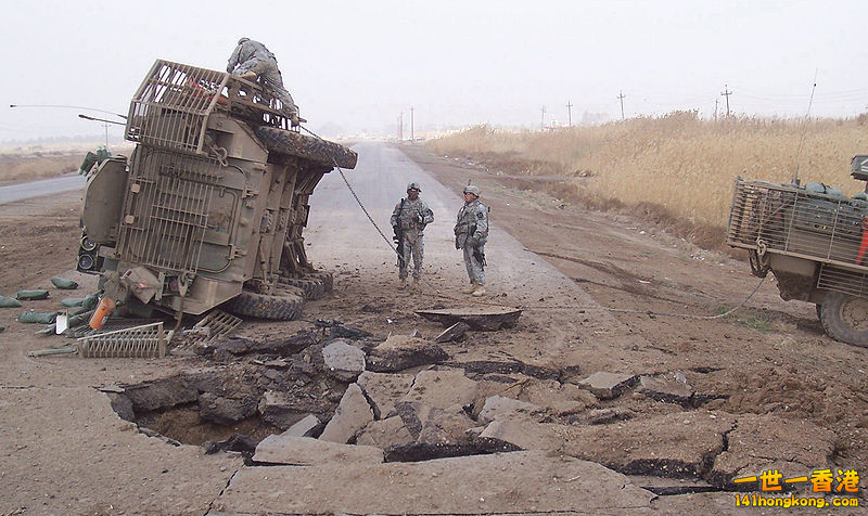 Stryker rolled over by a buried IED in 2007. All crew survived, but the vehicle .jpg