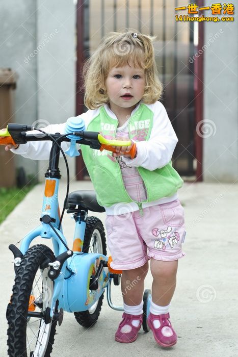 little-girls-bicycle-14584251.jpg