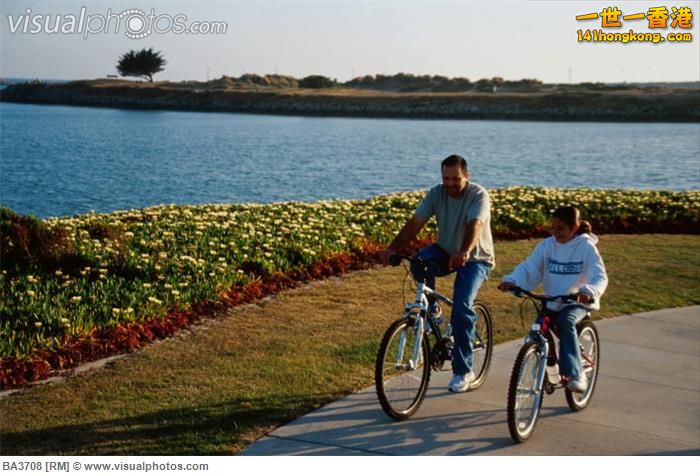 father_and_daughter_bikeriding_father_and_daughter_riding_bikes_at_marina_park_i.jpg