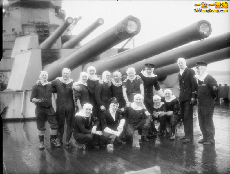 Gun crews of Duke of York under the ship\'s 14 inch guns at Scapa Flow af.jpg