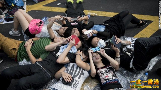 140929104244-hong-kong-monday-2-rest-on-ground.jpg