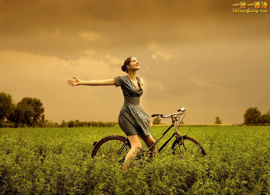 bigstock_beautiful_girl_riding_bicycle__12155192.jpg