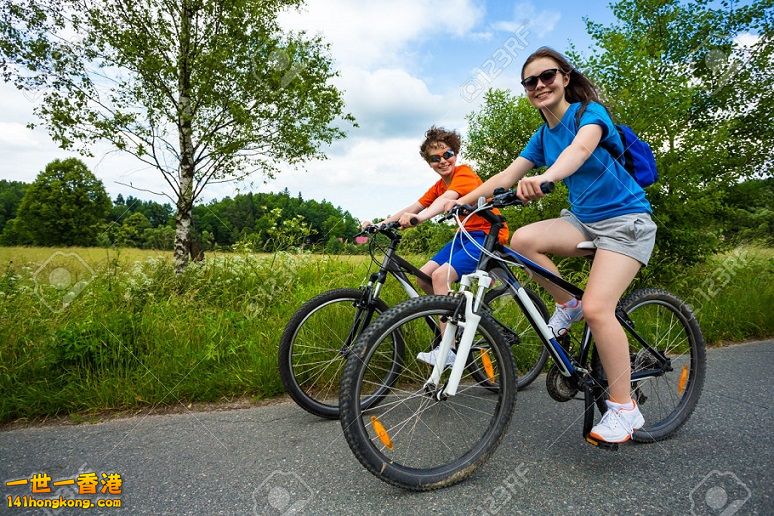 27232240-Healthy-lifestyle-teenage-girl-and-boy-biking-Stock-Photo.jpg