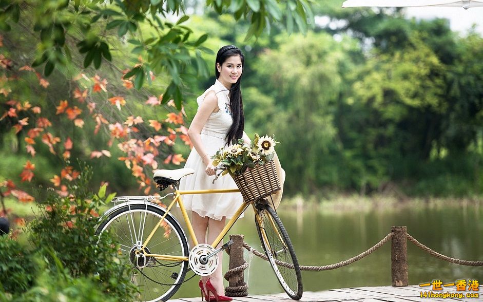 Asian-Woman-With-Bicycle-Wallpaper.jpg