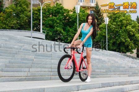 stock-photo-young-slim-sexy-sportive-woman-in-blue-shorts-and-white-snickers-lon.jpg