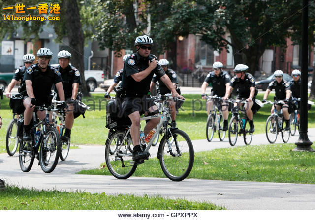 police-officers-on-bicycles-patrol-during-a-feminist-rally-ahead-the-gpxppx.jpg