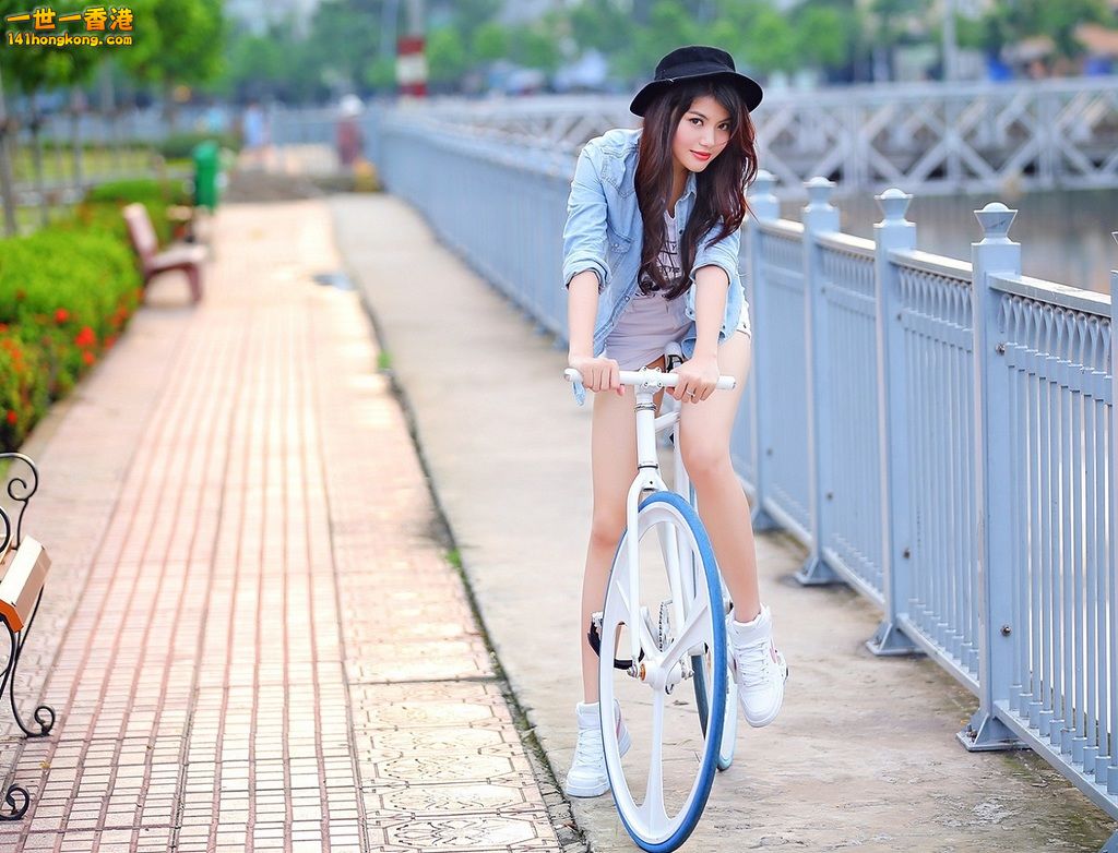 asian-women-bicycles-hat-outdoors-1080P-wallpaper.jpg