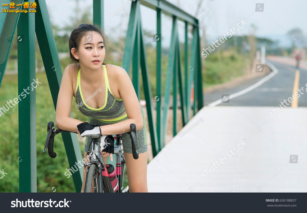 stock-photo-asian-woman-with-bicycle-on-on-the-bridge-636188837.jpg