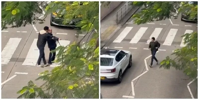 樂富一名司機主動落車攙扶一位持柺杖的老翁橫過斑馬線，兩線的車龍均耐心靜待.jpg