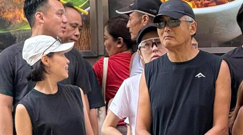 1 網民拍得發哥等一行十多人在酷熱天氣警告下跑步，其中彭羚（左一）及唐詩詠（發哥身.jpg